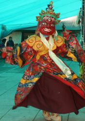 Makakala dancer in red mask