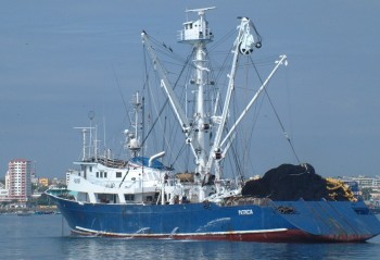 One of dozens of tuna clippers in Manta Harbor