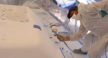 Mike spraying under the eves above the side windows