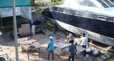 Moving from catamaran (right) to new work tent (left)