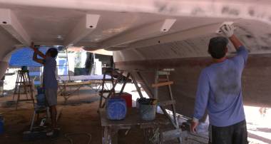Nut and Pla doing difficult sanding under the bridge-deck