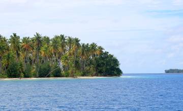Clear water, green islands of Kofiau, Raja Ampat