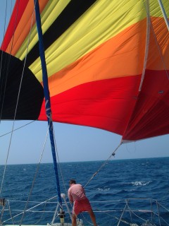 Jon is often on the bow adjusting the set of the spinnaker