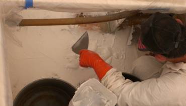 Pla spreading filler on the floor of the cockpit lockers