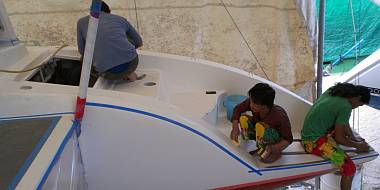 Pla, Yando & Chandron cleaning the starboard sugar-scoop