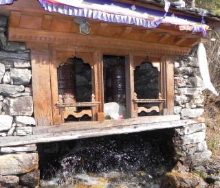 Water powered prayer wheels