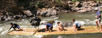 Running rapids on a bamboo raft! 