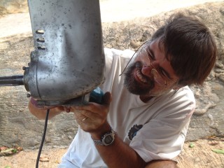 Jon cleans the saildrive, now that it's re-mounted and secure