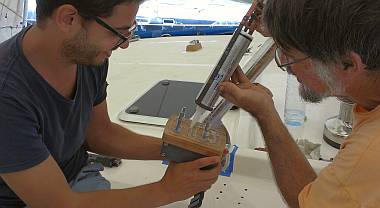 Roy and Jon mount a set of 3 spinlocks to the port cabin-top