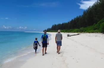 Jon and Per Ardua crew on beautiful Turtle Island 