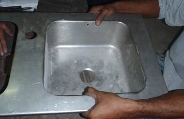 Welding the sinks to the underside of the countertop is simple