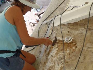 Sue chipping out old balsa above the new tank area