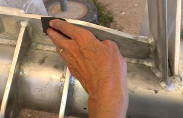 "Finger" sanding the fiddly bits of the forebeam