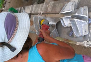 Sue working on the anchor support bracket & forebeam supports
