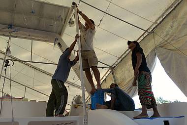 Jon perched miles up in the air reconnecting the davit supports