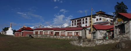 Thangboche Monastery in morning light, with mountains behind