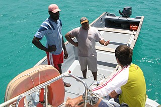 Chatting on the back of the boat.