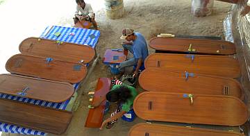 Yando, Heru, & Chambron sanding under Ocelot's stern